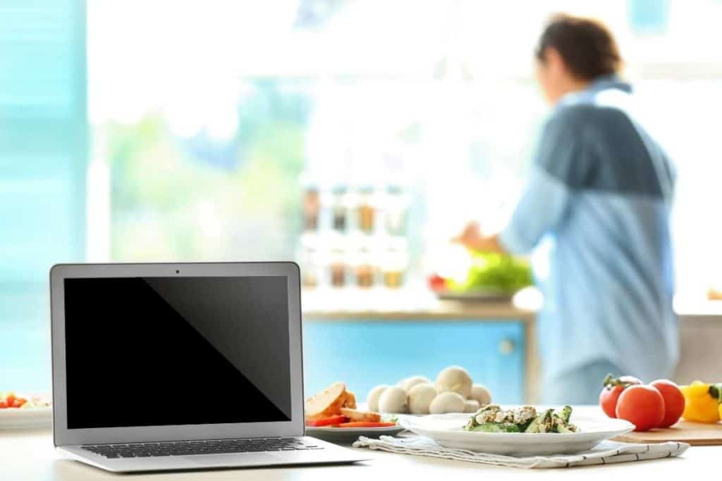 Make Money with a Food Blog laptop on table with food